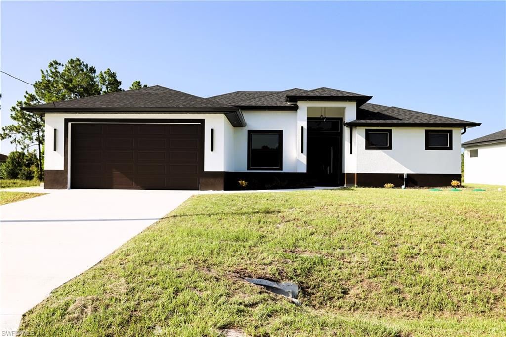 1214 Delores ST E, LEHIGH ACRES, FL 33974 — exterior