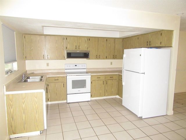 23023 FOOTE AVENUE, Port Charlotte, FL 33952