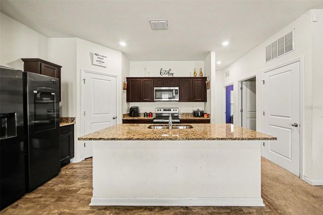 1006 COMMUTER DR, Deltona, FL 32738