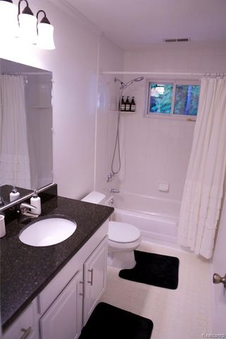 1205 E 14 Mile Rd, Birmingham, MI 48009