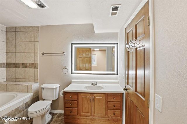 18660 Kings Point Circle, Eagle River, AK 99577