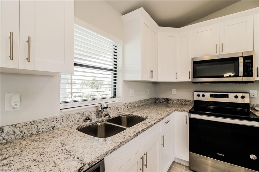2702 31st ST SW, LEHIGH ACRES, FL 33976 — photo 5