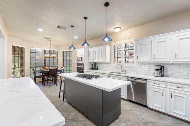 39327 Lago Drive, Magnolia, TX 77354