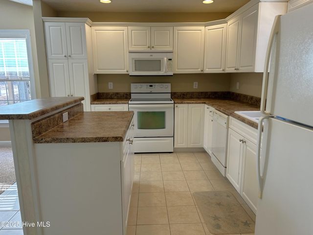 115 NW 20th Street, Oak Island, NC 28465