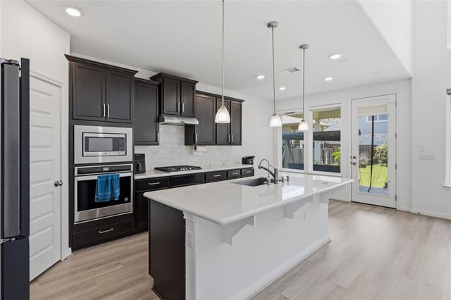 7220 Poulain DR, Austin, TX 78738