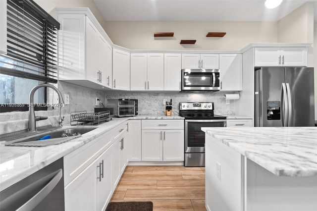 9265 NW 16th Street, Pembroke Pines, FL 33024