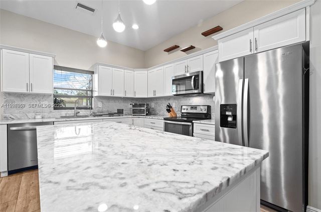 9265 NW 16th Street, Pembroke Pines, FL 33024