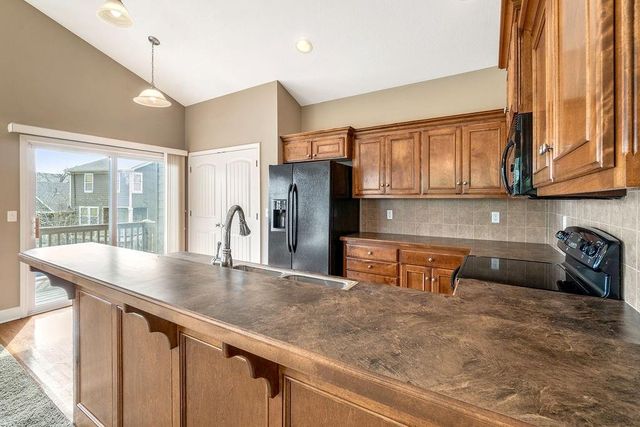 11171 S Woodsonia Drive, Olathe, KS 66061