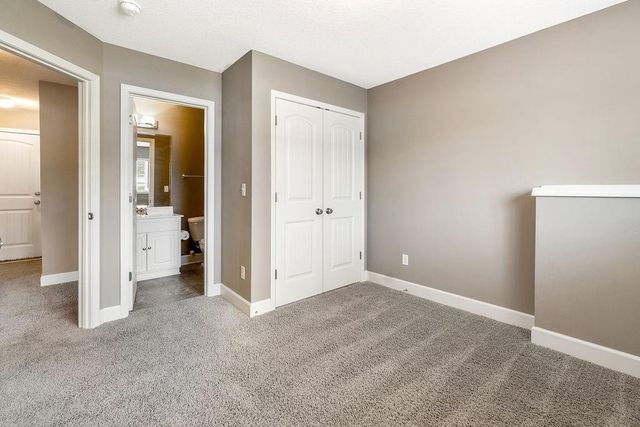 11171 S Woodsonia Drive, Olathe, KS 66061