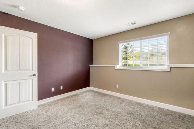 11171 S Woodsonia Drive, Olathe, KS 66061