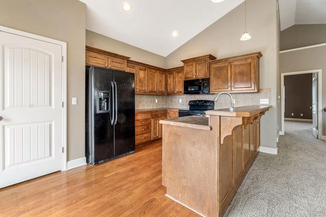 11171 S Woodsonia Drive, Olathe, KS 66061