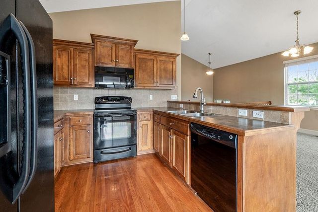 11171 S Woodsonia Drive, Olathe, KS 66061