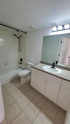 5011 WILES Road 104, Coconut Creek, FL 33073