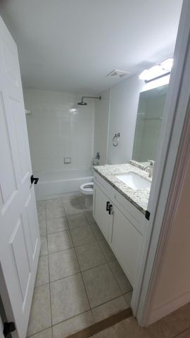 5011 WILES Road 104, Coconut Creek, FL 33073