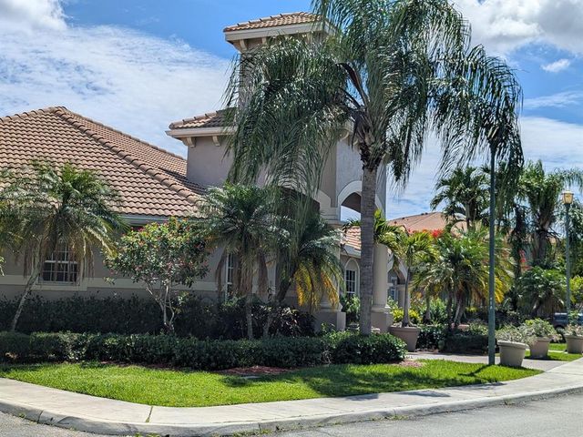 5011 WILES Road 104, Coconut Creek, FL 33073