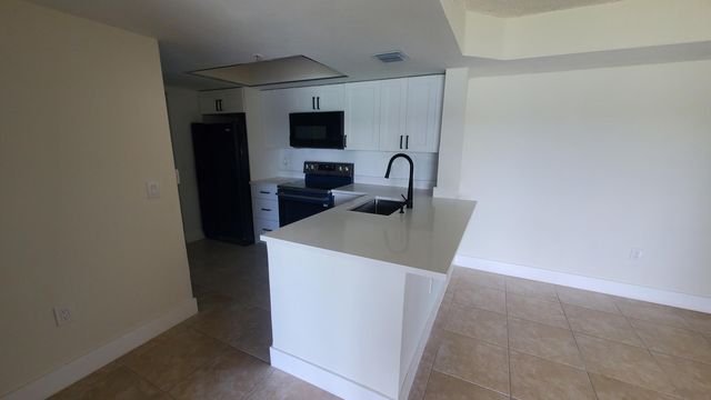 5011 WILES Road 104, Coconut Creek, FL 33073
