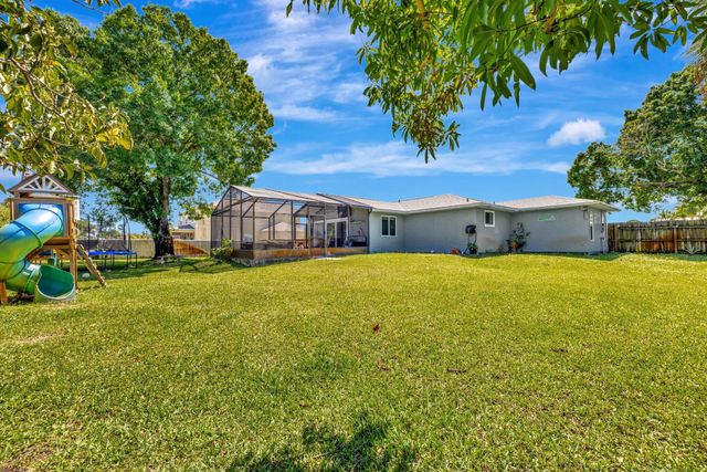 1041 SW General Patton Terrace, Port St Lucie, FL 34953
