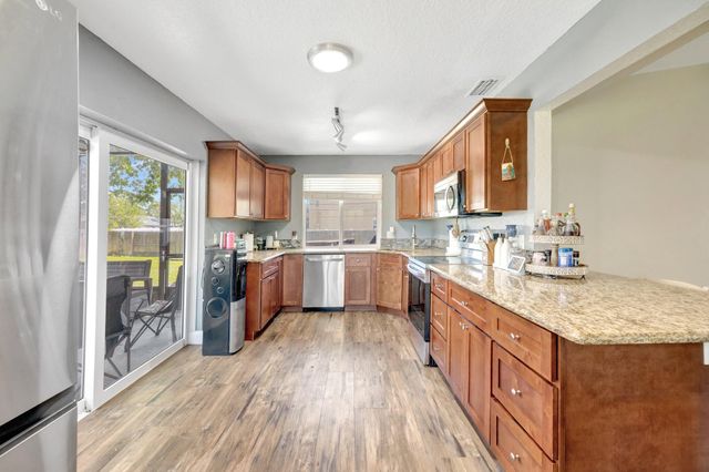 1041 SW General Patton Terrace, Port St Lucie, FL 34953