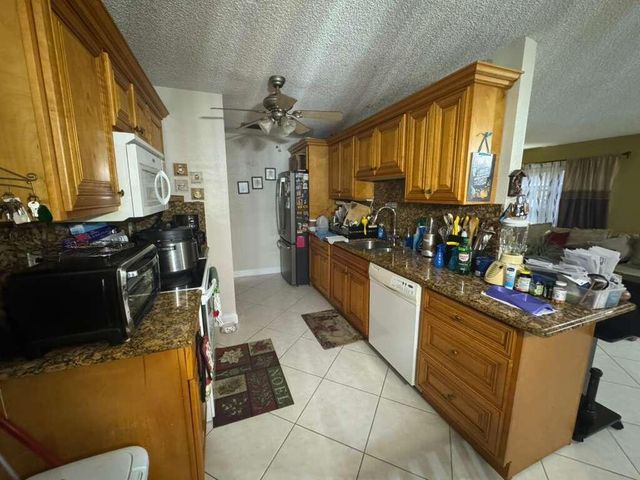 5061 Alfred Drive, West Palm Beach, FL 33417