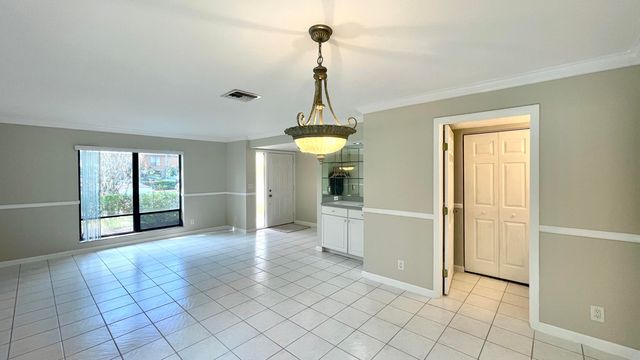 501 SANDTREE Drive, Palm Beach Gardens, FL 33403