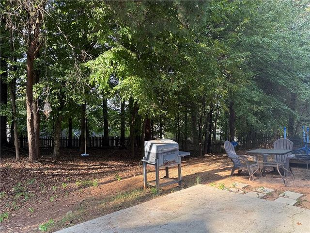 5873 Riverside Walk Drive, Sugar Hill, GA 30518