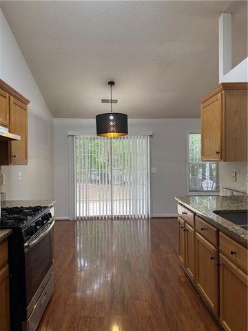 5873 Riverside Walk Drive, Sugar Hill, GA 30518
