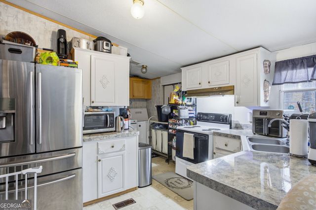 305 Woodmont Court, Canton, GA 30115