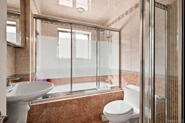 99-57 65th Road, Rego Park, NY 11374