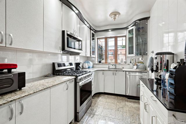 99-57 65th Road, Rego Park, NY 11374