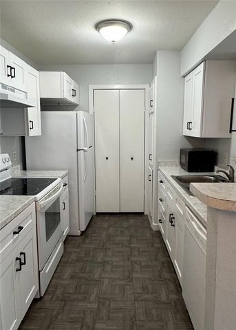 5540 DEVONBRIAR WAY 203, Orlando, FL 32822