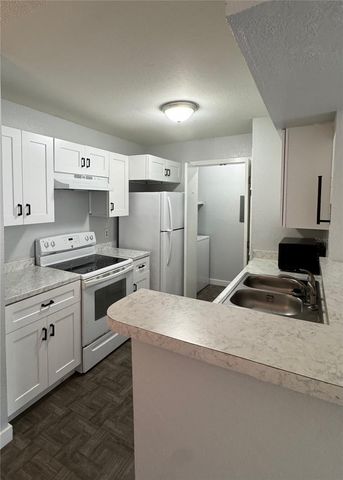 5540 DEVONBRIAR WAY 203, Orlando, FL 32822