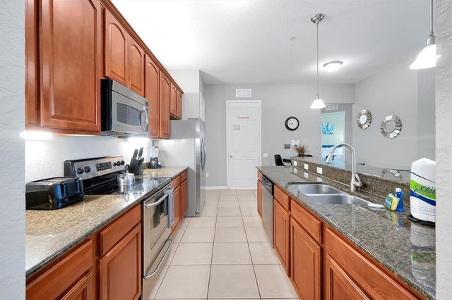 5048 SHOREWAY LOOP 40104, Orlando, FL 32819