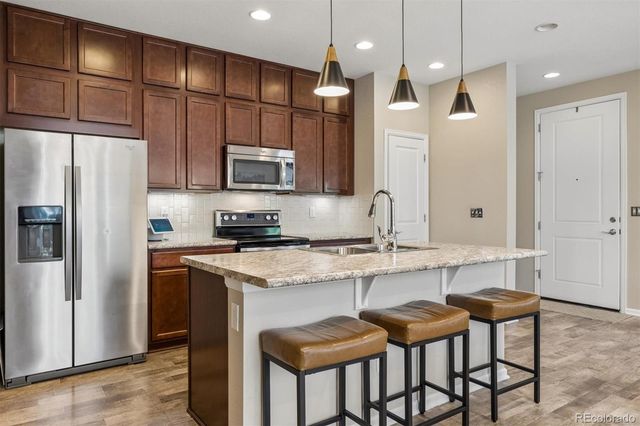 1212 S Clinton Street, Denver, CO 80247