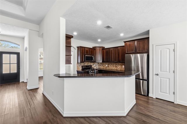 11711 Diamond Court, Mont Belvieu, TX 77535