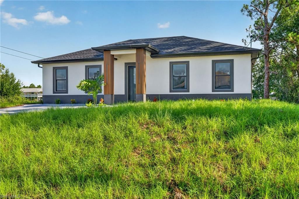 4018 10th ST SW, LEHIGH ACRES, FL 33976 — exterior