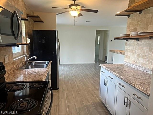 16 Greenwood AVE, Lehigh Acres, FL 33936
