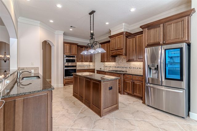 1302 Majestic Pines Court, Houston, TX 77345