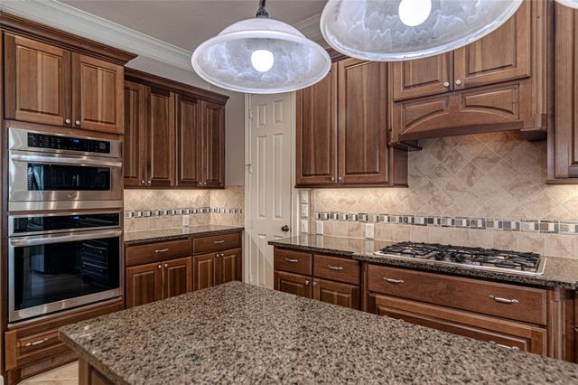 1302 Majestic Pines Court, Houston, TX 77345