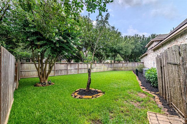 1302 Majestic Pines Court, Houston, TX 77345
