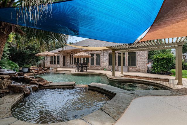 1302 Majestic Pines Court, Houston, TX 77345