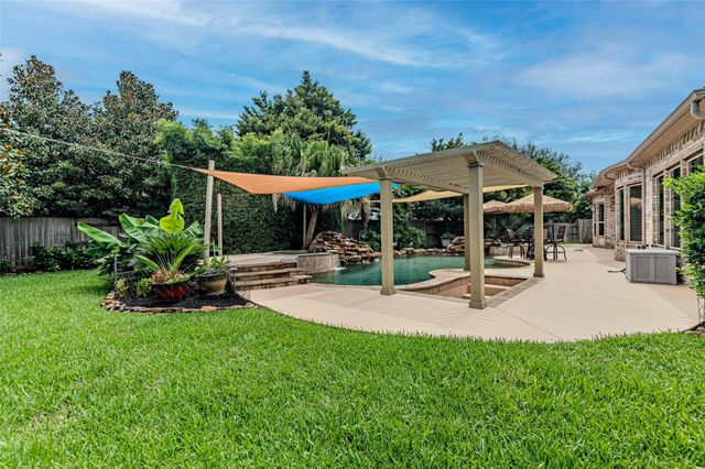 1302 Majestic Pines Court, Houston, TX 77345