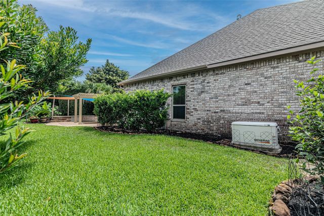 1302 Majestic Pines Court, Houston, TX 77345