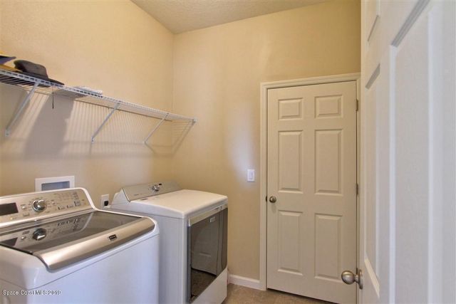 953 Musgrass Circle, West Melbourne, FL 32904