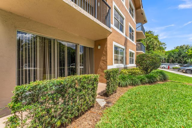 8721 Wiles Road 103, Coral Springs, FL 33067