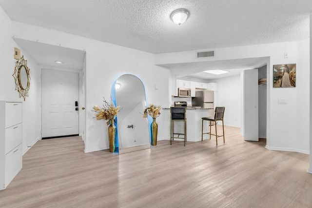 8721 Wiles Road 103, Coral Springs, FL 33067