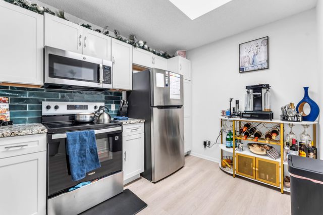8721 Wiles Road 103, Coral Springs, FL 33067