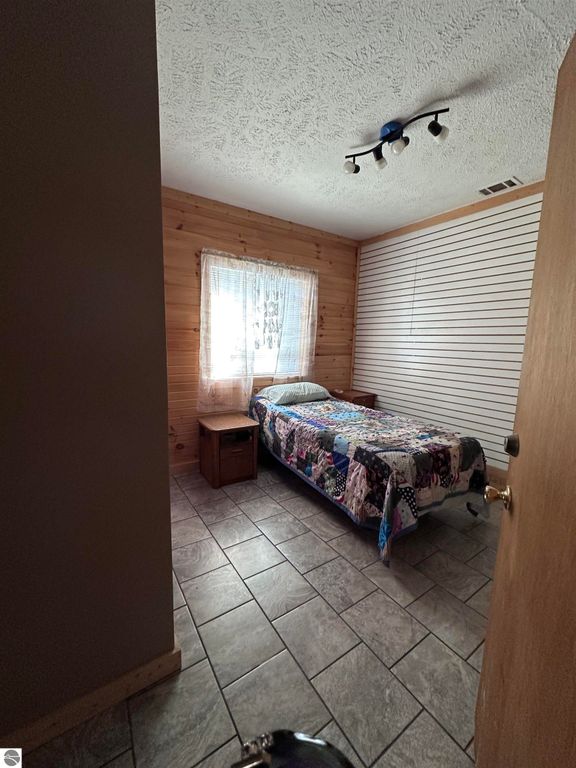 Image 12 of property listing at 5935 Greenleaf Lane, Grawn, MI 49637