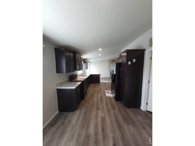 113 Juniper Cir, Log Lane Village, CO 80705