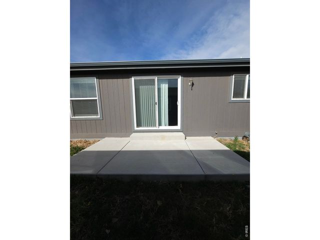 113 Juniper Cir, Log Lane Village, CO 80705