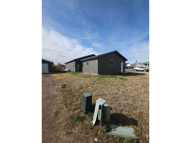 113 Juniper Cir, Log Lane Village, CO 80705